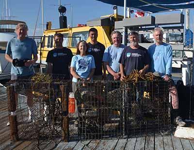 Oda Volunteer Boat & Dive Crew at dock with recovered traps