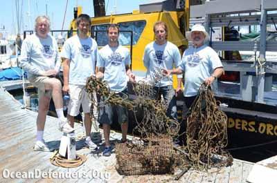 Kurt, Andy The, Steve Millington, John Krieger, and Graham Futerfas back at the slip with the day’s haul. One trap, lots of trap remnants, and about 300 feet of polypropylene line.