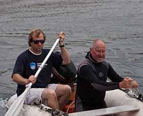 John Krieger andRoger Russell rowing Zodiac