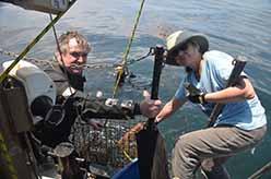 ODA volunteer crew Al Laubenstein and Lisa Davis hauling trap (Kurt Leiber in water)