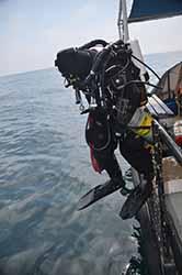 Volunteer rebreather diver Danny entering the water
