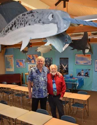 Kurt Lieber and teacher Tim Pearson celebrate the ocean conservation education of the kids!