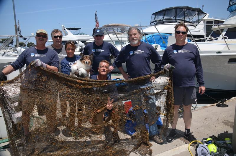 Ocean Defenders Dive and Boat Crew with the ocean debris they hauled in.