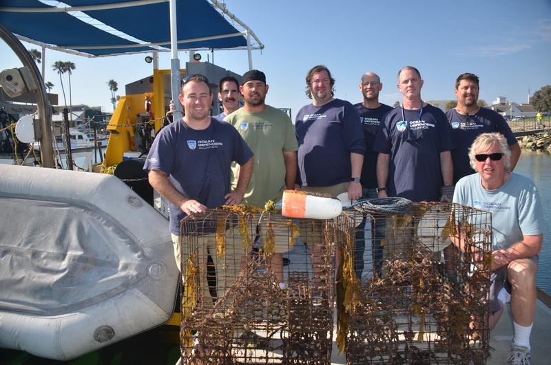 ODA Volunteer Dive & Boat Crew display the abandoned lobster traps removed from the sea.