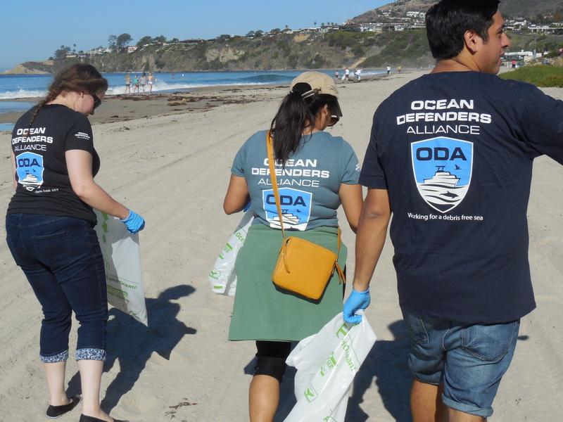 Disney and Ocean Defenders Alliance clean the Orange County Beach together