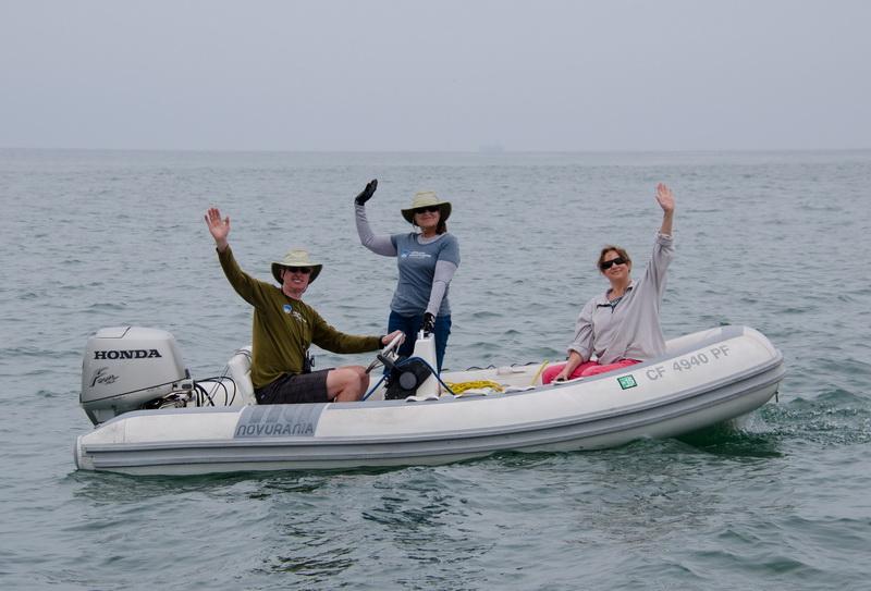 Rigid Inflatable Boat crew - Julia, Lisa, and Jim in RIB