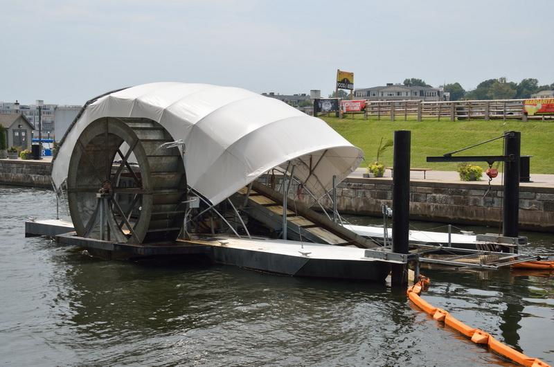 Water Wheel conveyer cleans debris out of harbor