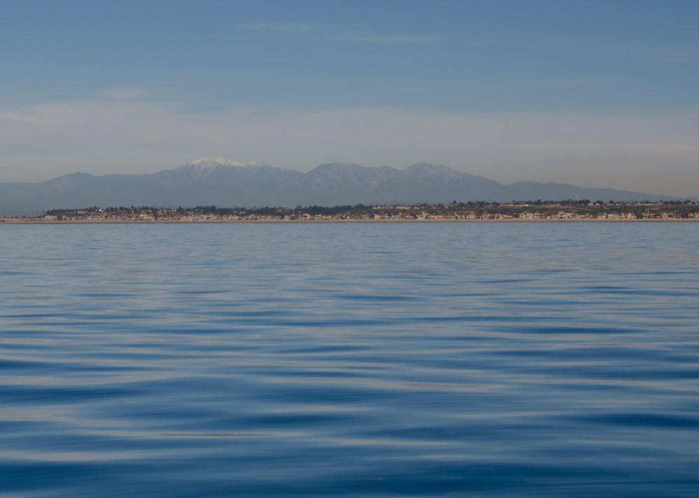 View from Newport Beach waters back to mountains