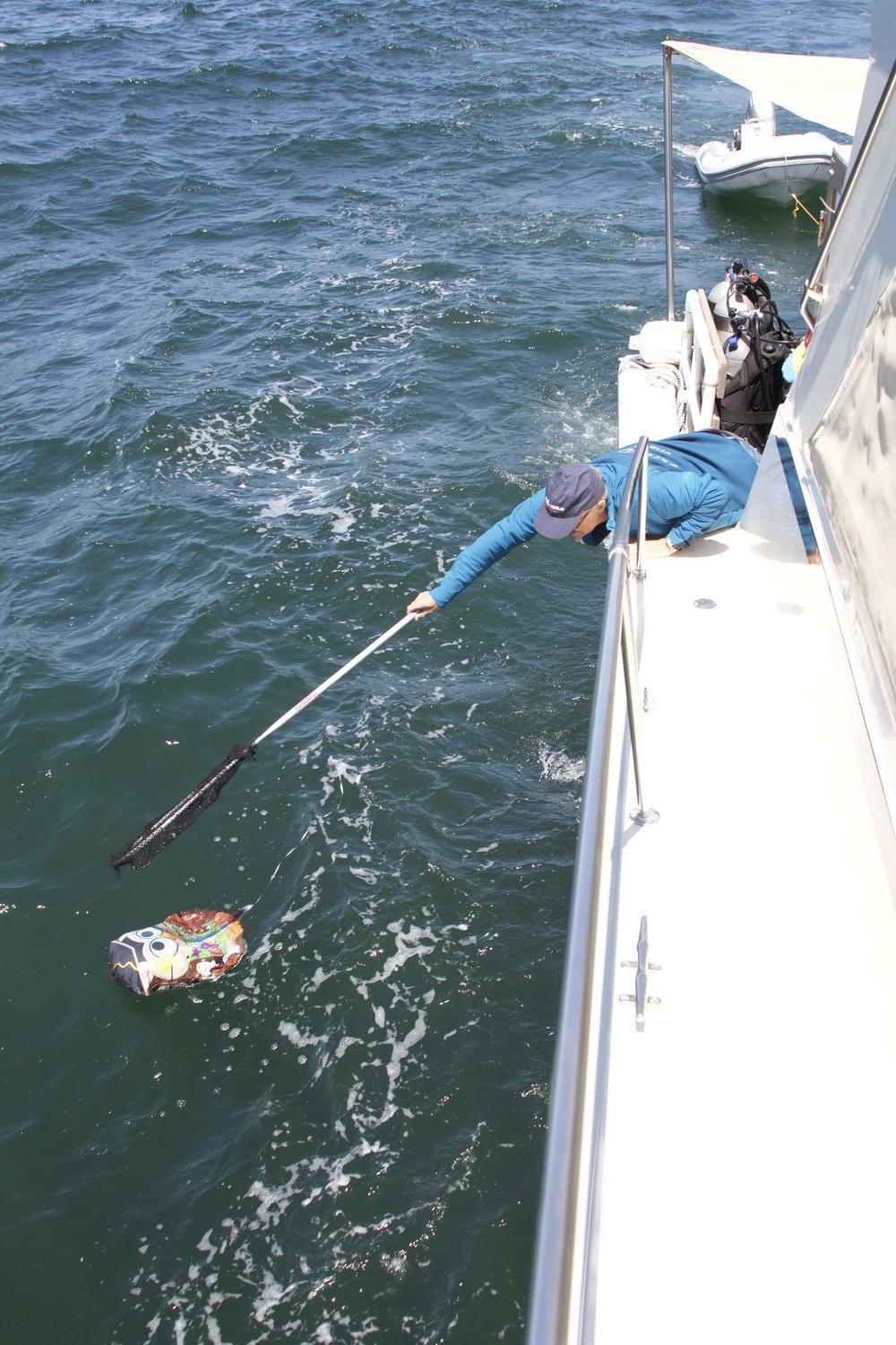 Ocean Defenders removing Mylar balloon debris from the sea