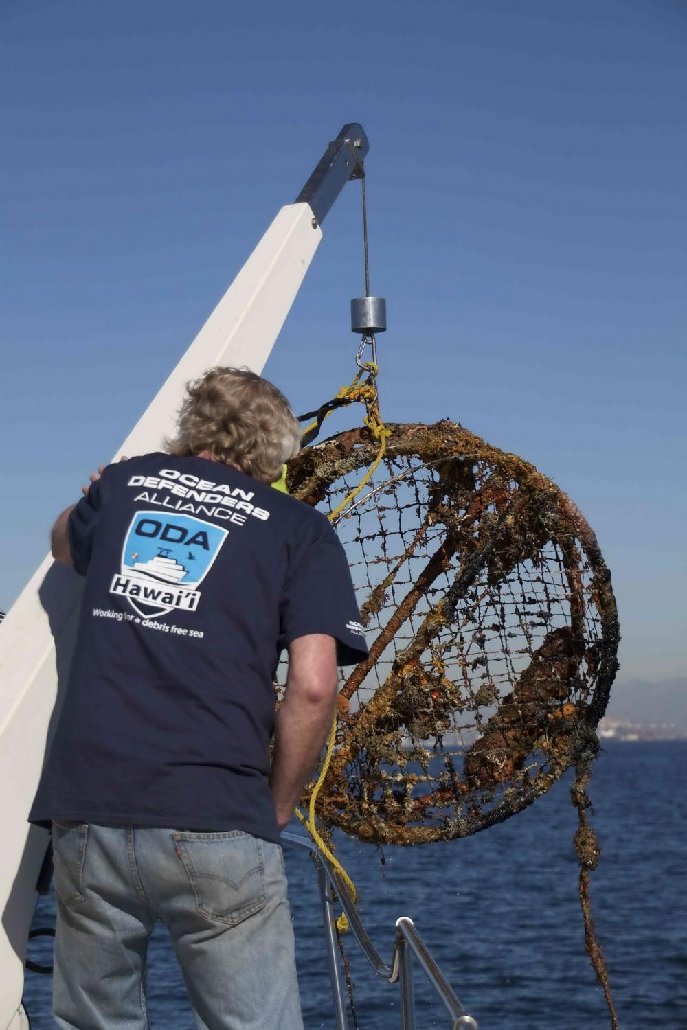 ODA hauls crab trap out of the ocean