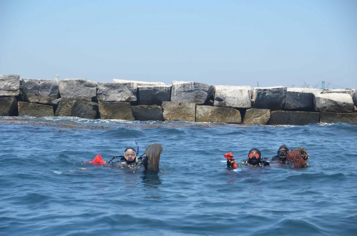 ODA divers with recovered debris