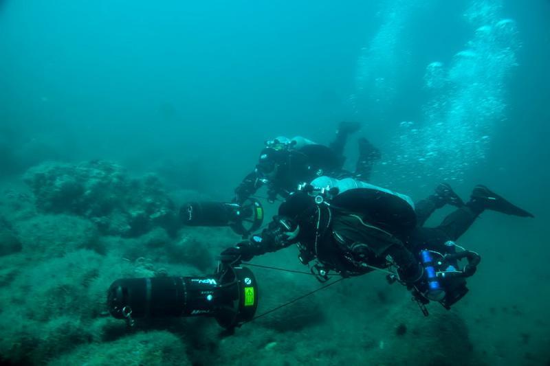 Example of ODA divers using scooters