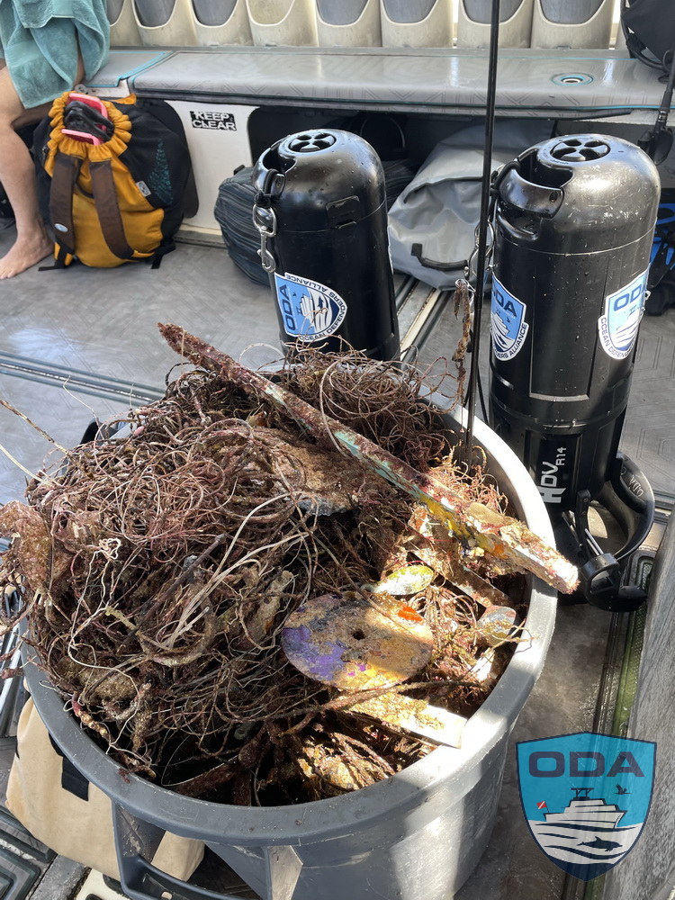 Trash can full of marine debris removed