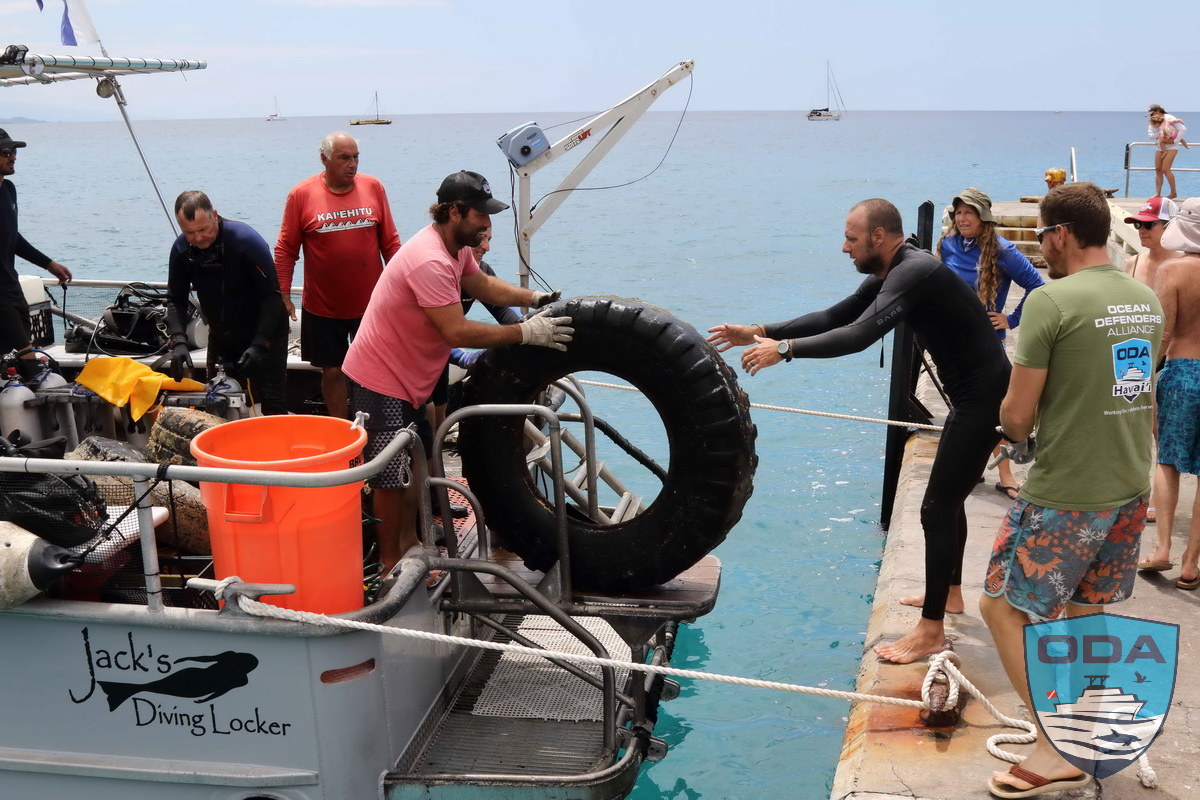 Jack's Diving Locker boat helps bring in sunken tires