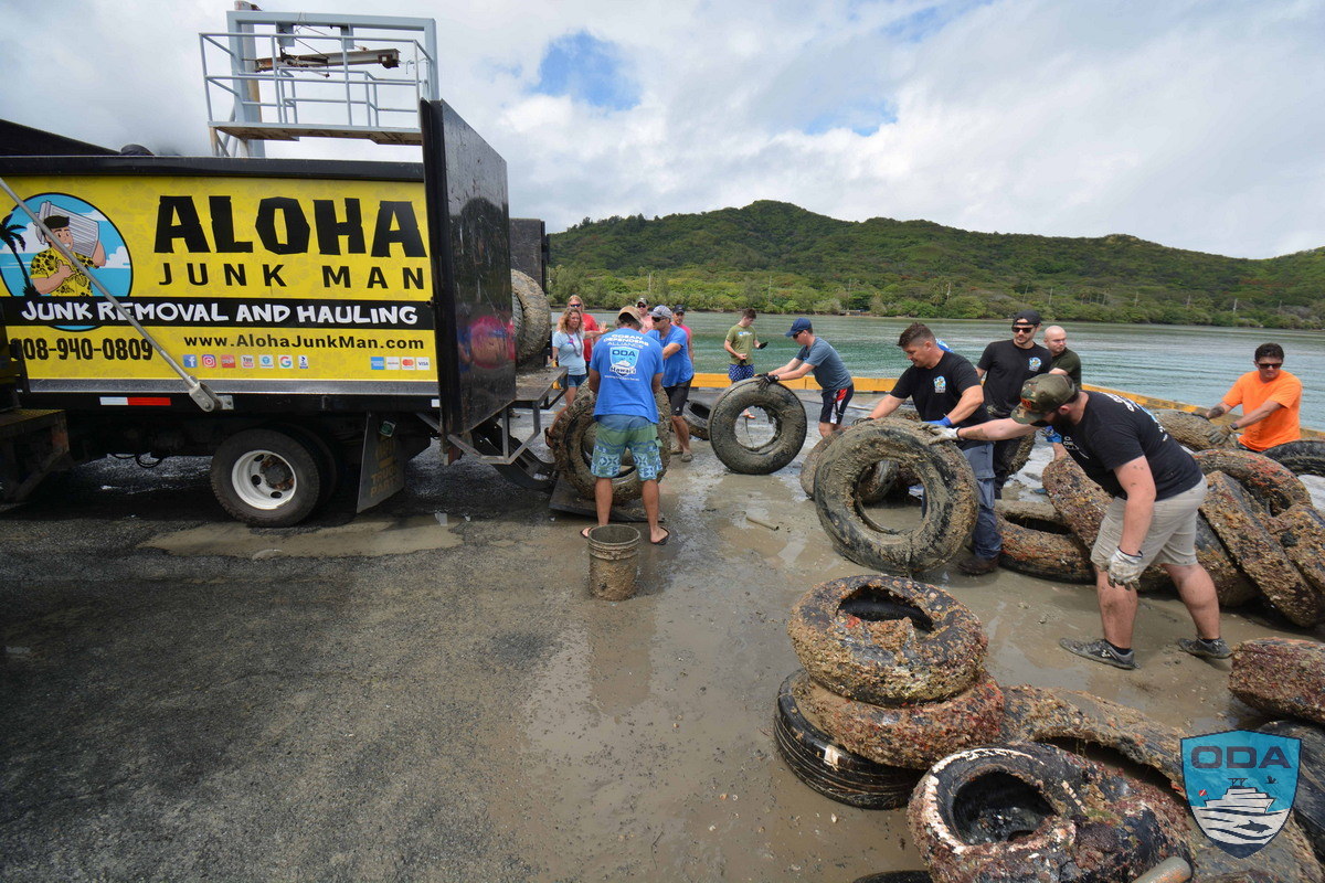 Loading truck with marine debris for proper removal