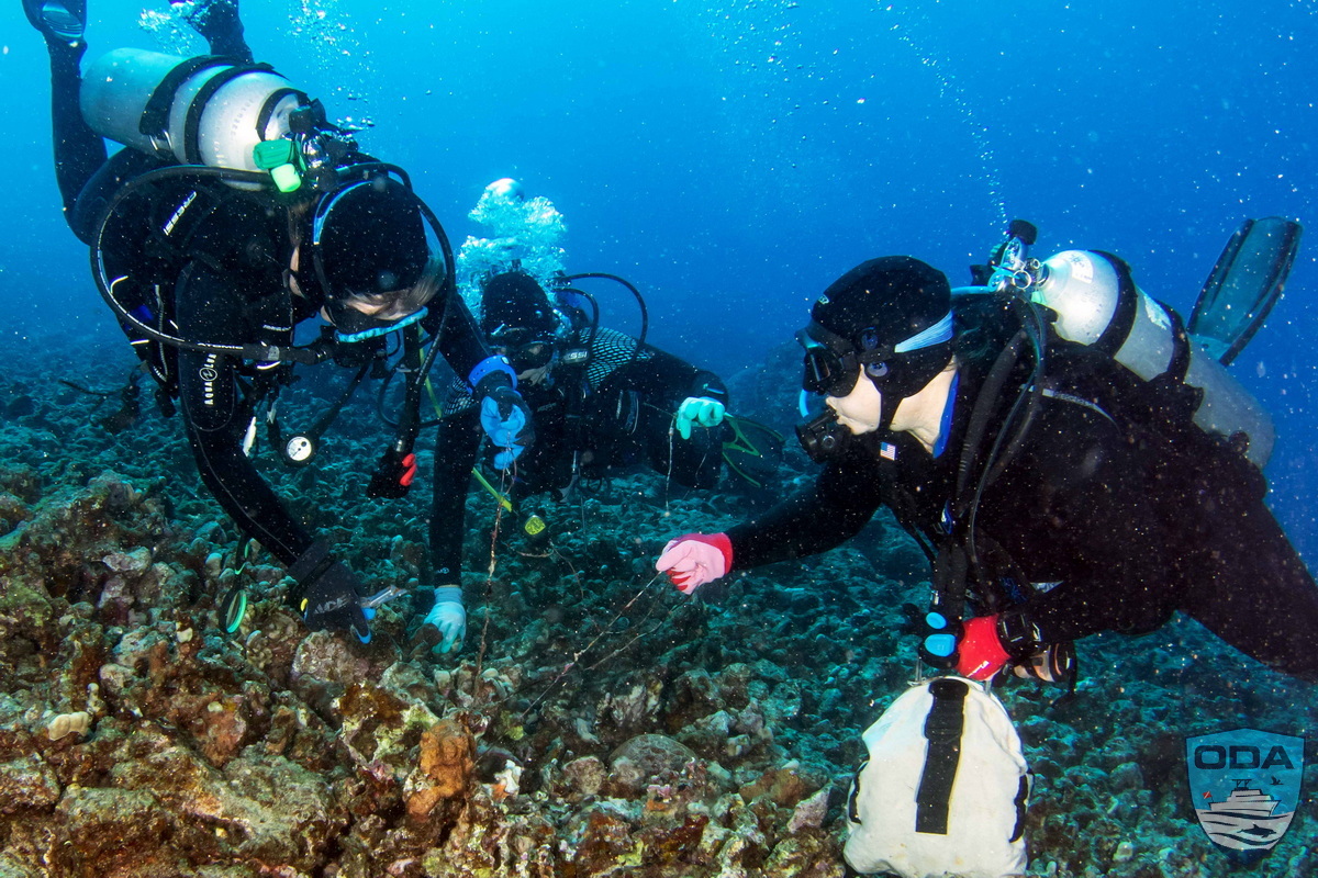 Divers removing ghost gear