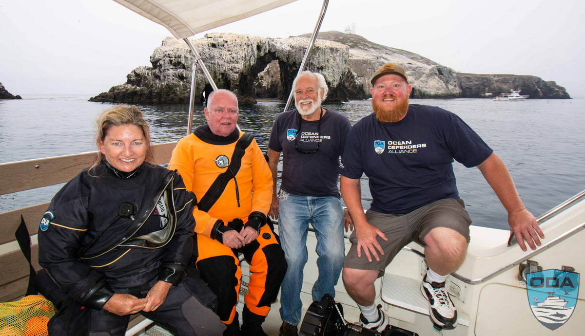 Debris-removing crew ready to clean the ocean, Anacapa Is in background