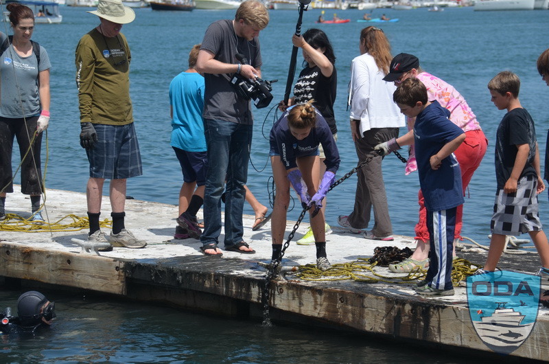 Angus filming ODA harbor clean up in July 2014