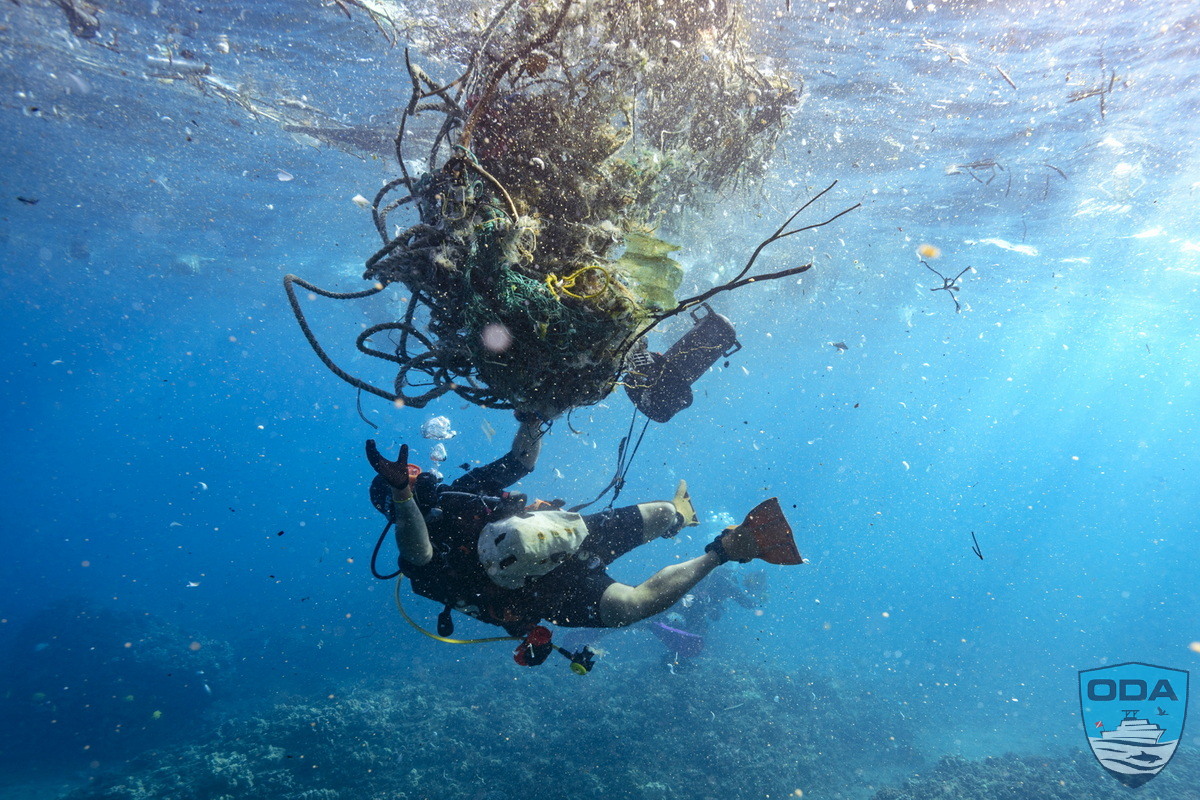 ODA underwater scuba Divers removing debris