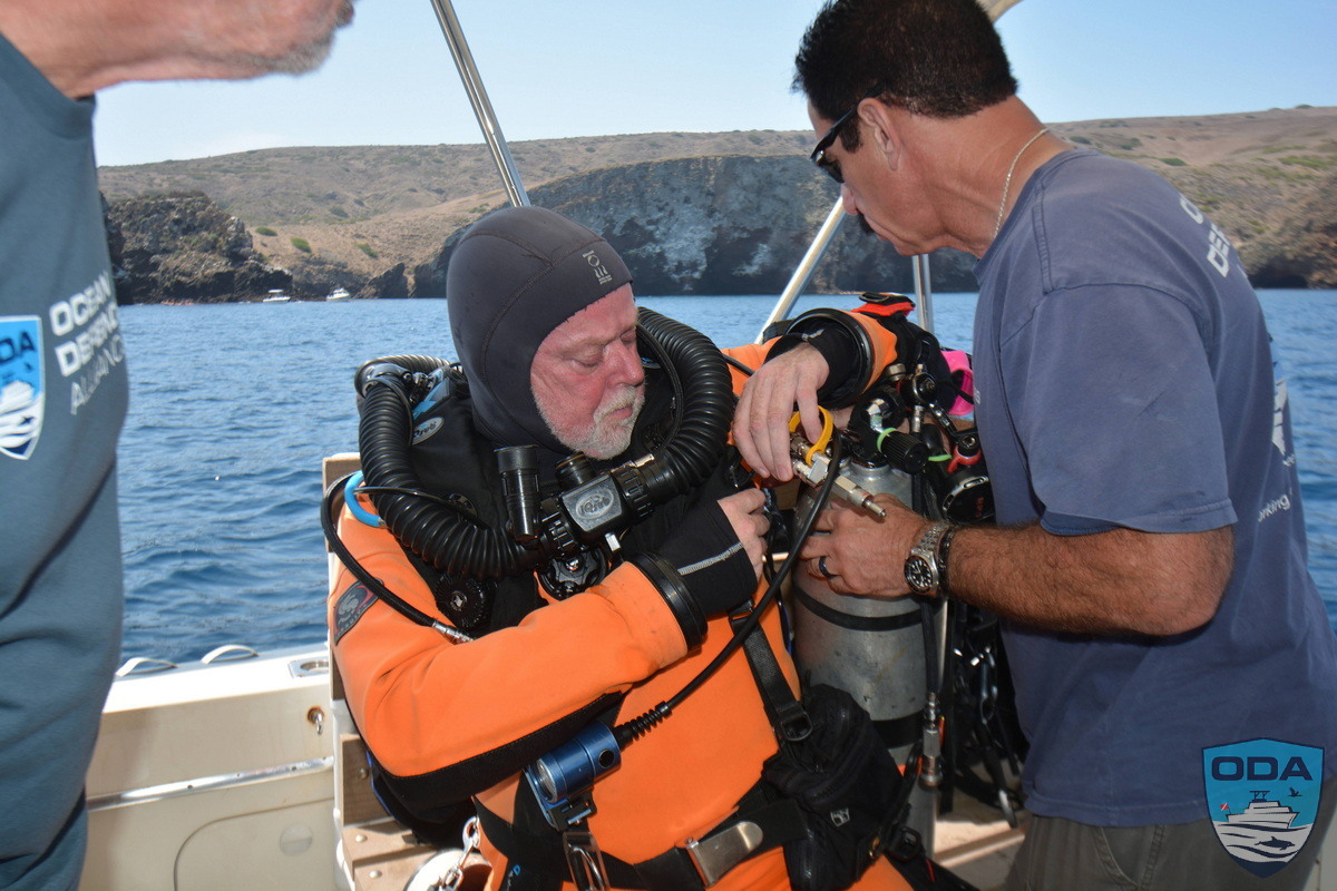Divers don their scuba gear