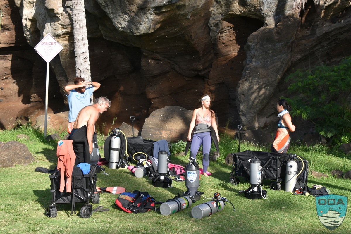Ocean Defenders scuba divers gearing up to remove trash and ghost gear