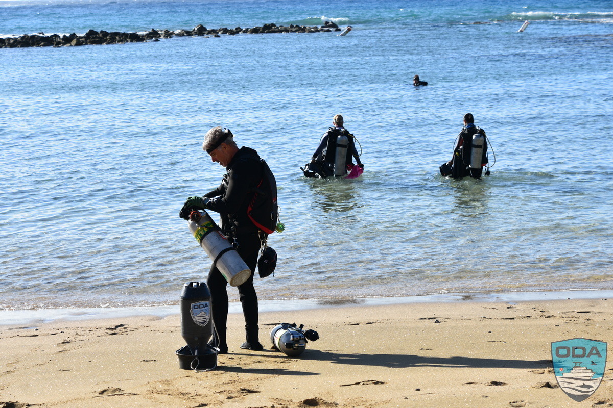 ODA volunteer marine conservationists prepare to haul out derelict fishing gear and detrius